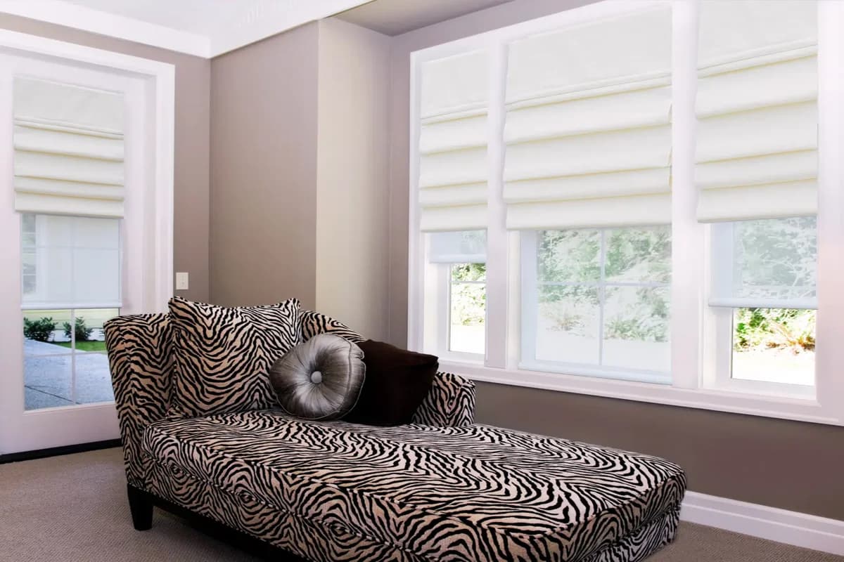 Elegant roman shades providing privacy and light control installed by Nexton Shutters & Blinds